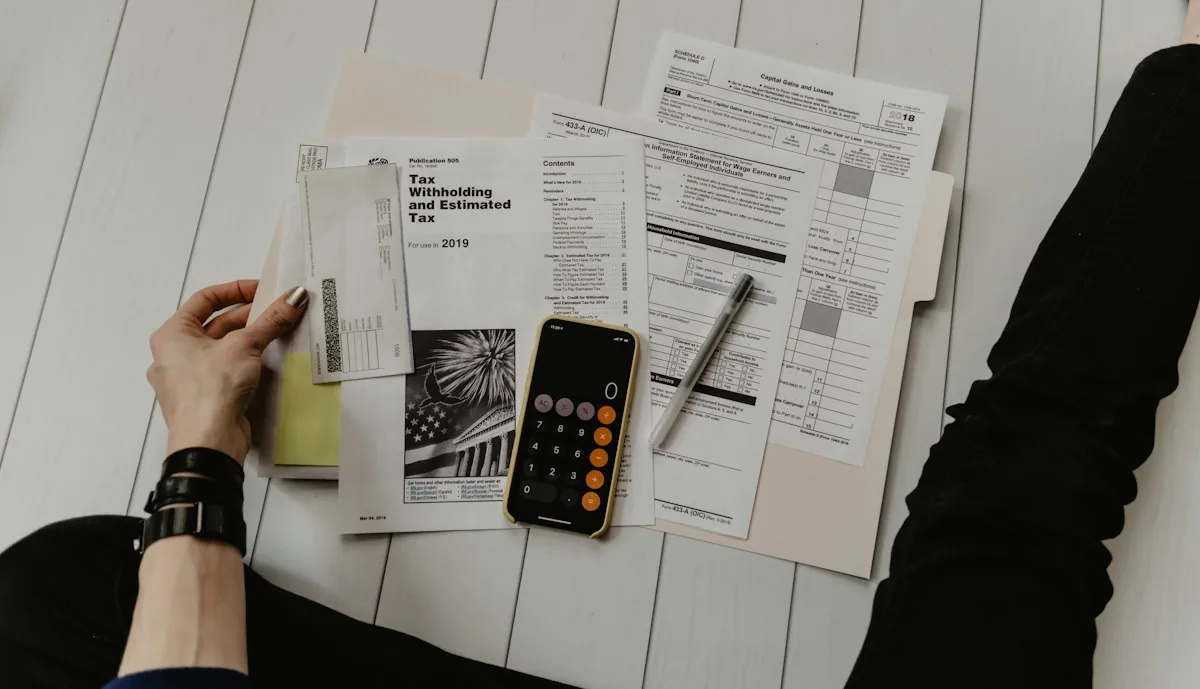 Bookkeeper organizing financial records with a calculator